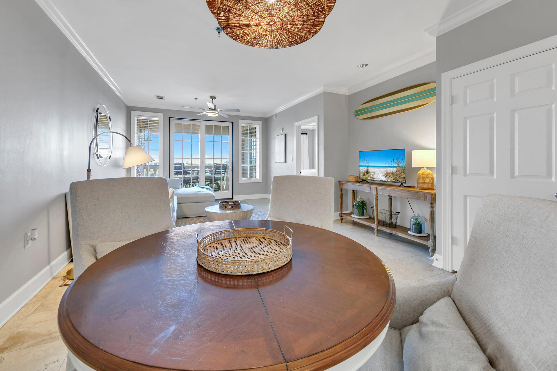 10343 East County Highway 30A, Unit 410 Inlet Beach, FL 32413 - Photo 16 of 32 a room with furniture and a chandelier