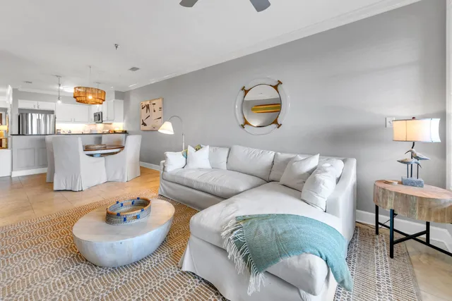 a living room with furniture and a table