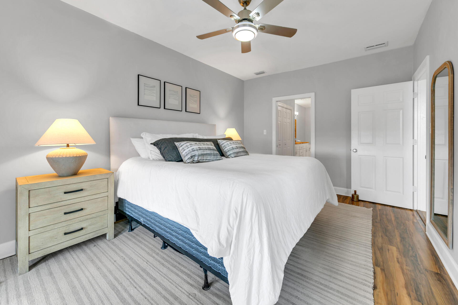 10343 East County Highway 30A, Unit 410 Inlet Beach, FL 32413 - Photo 23 of 32 a bedroom with a bed and wooden floor