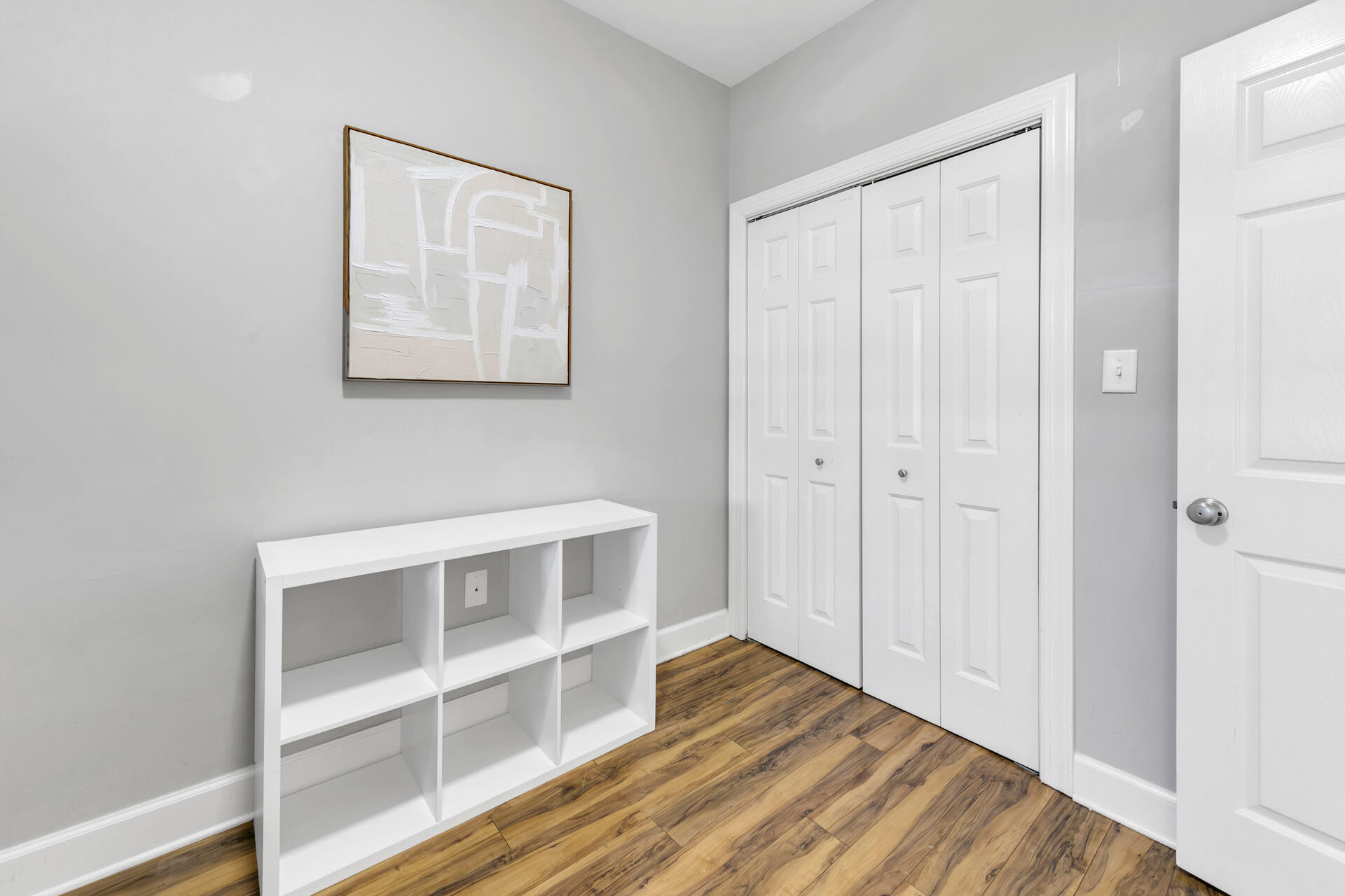 10343 East County Highway 30A, Unit 410 Inlet Beach, FL 32413 - Photo 5 of 32 a view of a livingroom with wooden floor and closet