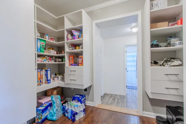 a white bath tub sitting in a bathroom