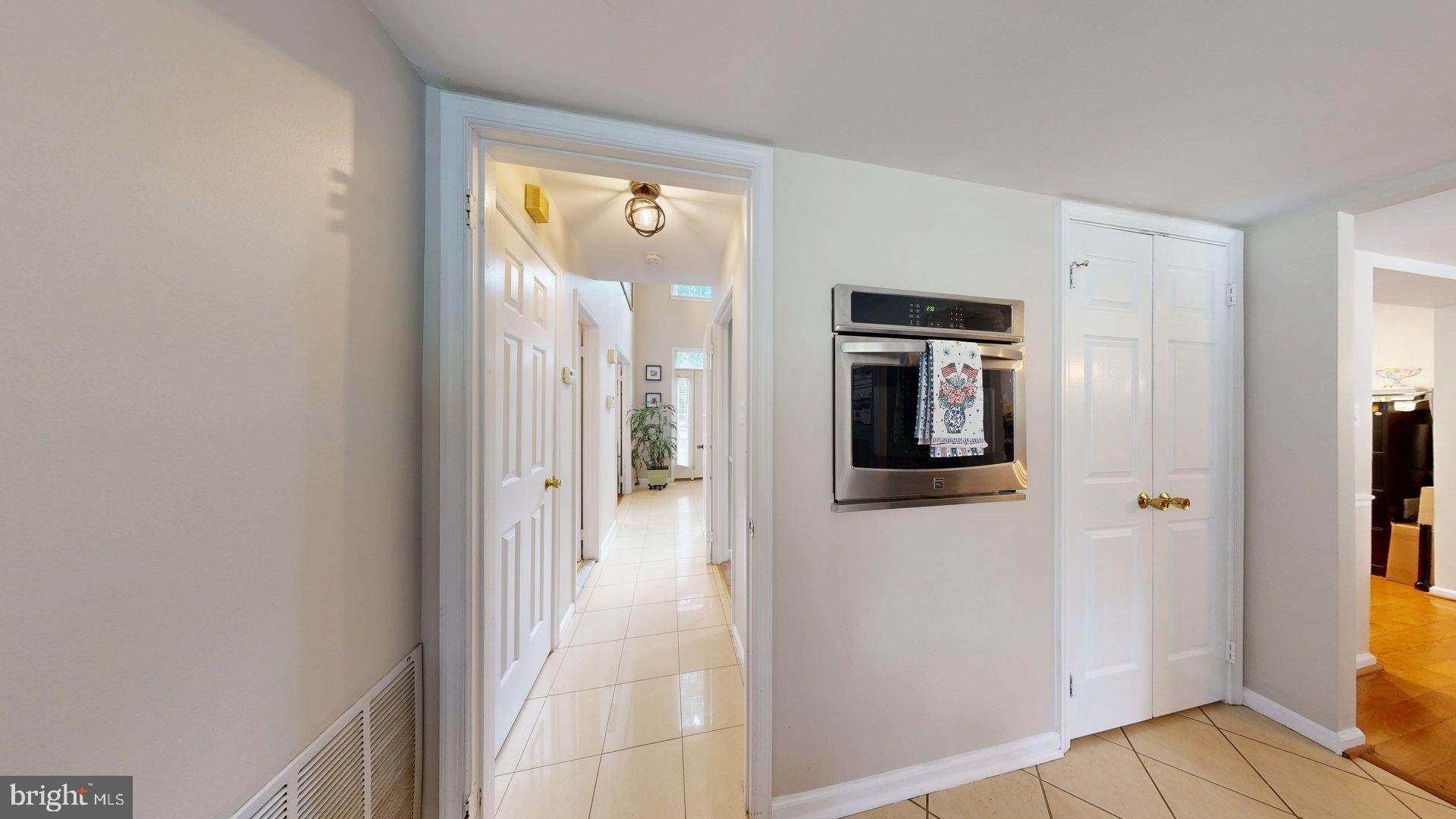 11901 Rustic Farm Court Germantown, MD 20874 - Photo 10 of 134 Inviting hallway with modern touches.