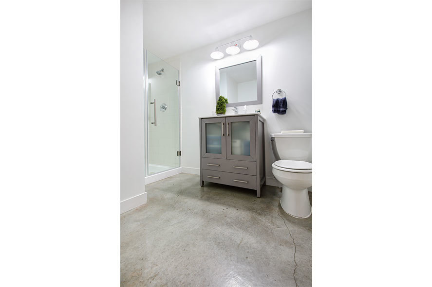 939 West Madison Street, Unit 510 Chicago, IL 60607 - Photo 13 of 13 a room with a toilet and a mirror