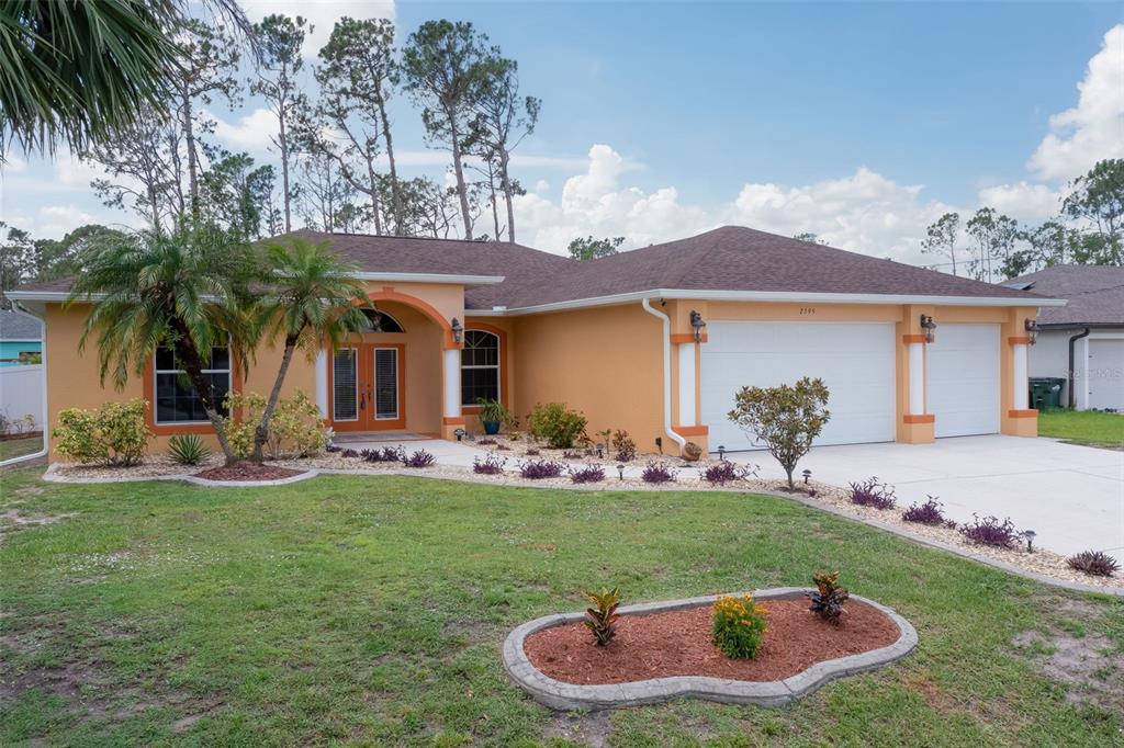 2595 Rolling Road North Port, FL 34288 - Photo 1 of 1 Beautifully Landscaped