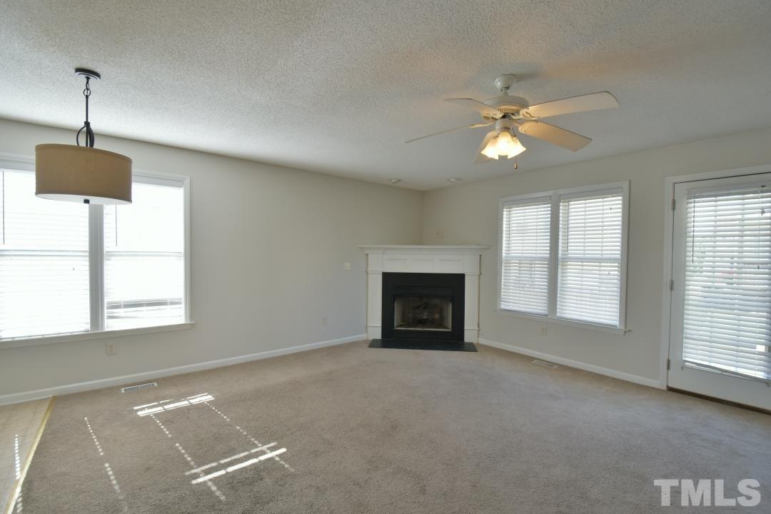 4408 Windsock Lane Raleigh, NC 27616 - Photo 13 of 22 Living room was updated to linoleum flooring
