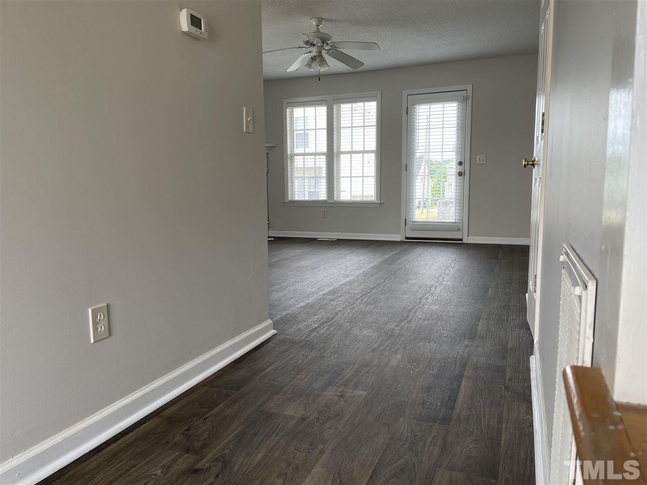 4408 Windsock Lane Raleigh, NC 27616 - Photo 10 of 22 Living room was updated to linoleum flooring