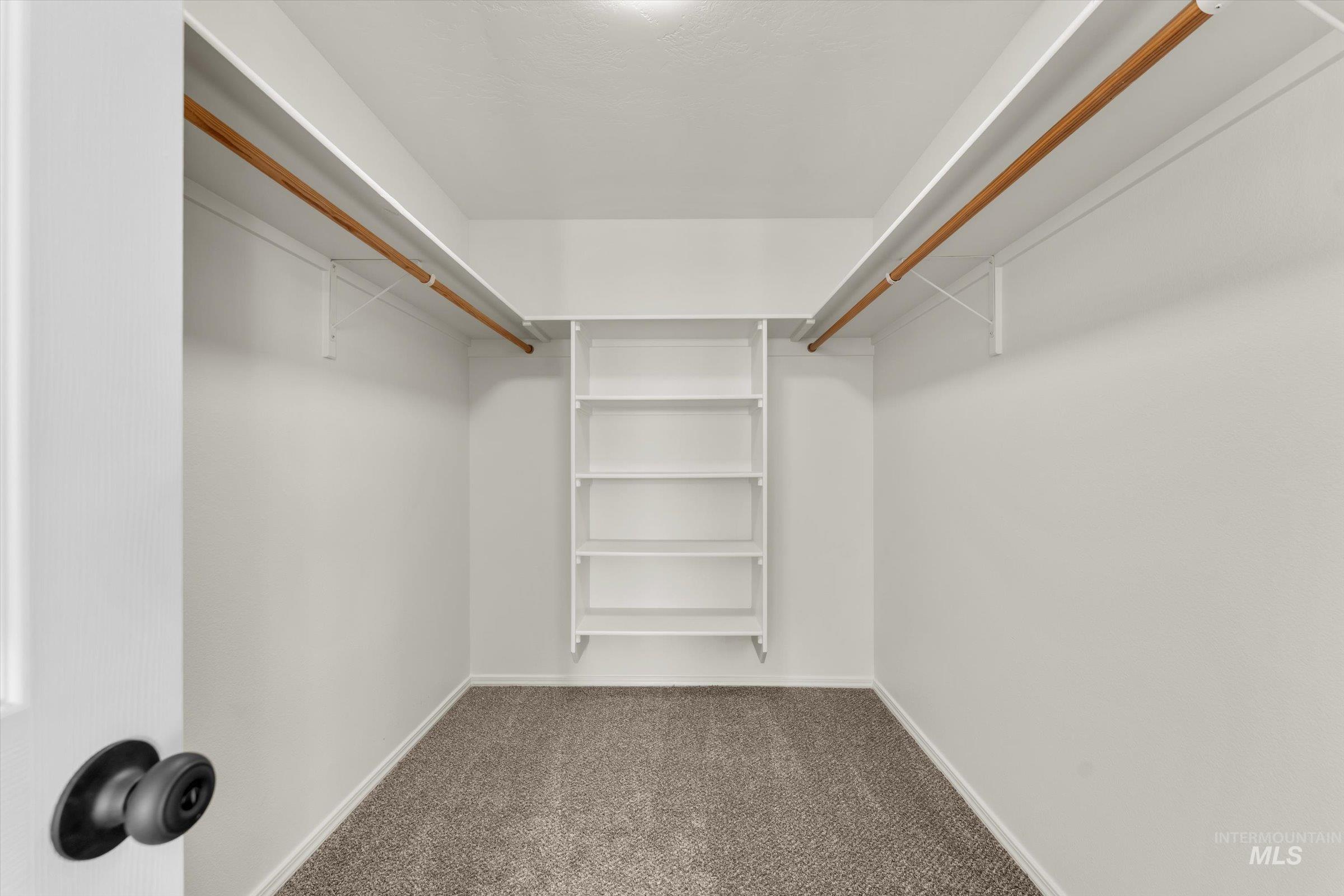 5602 Barkley Way Caldwell, ID 83607 - Photo 16 of 36 Walk in closet with dark colored carpet