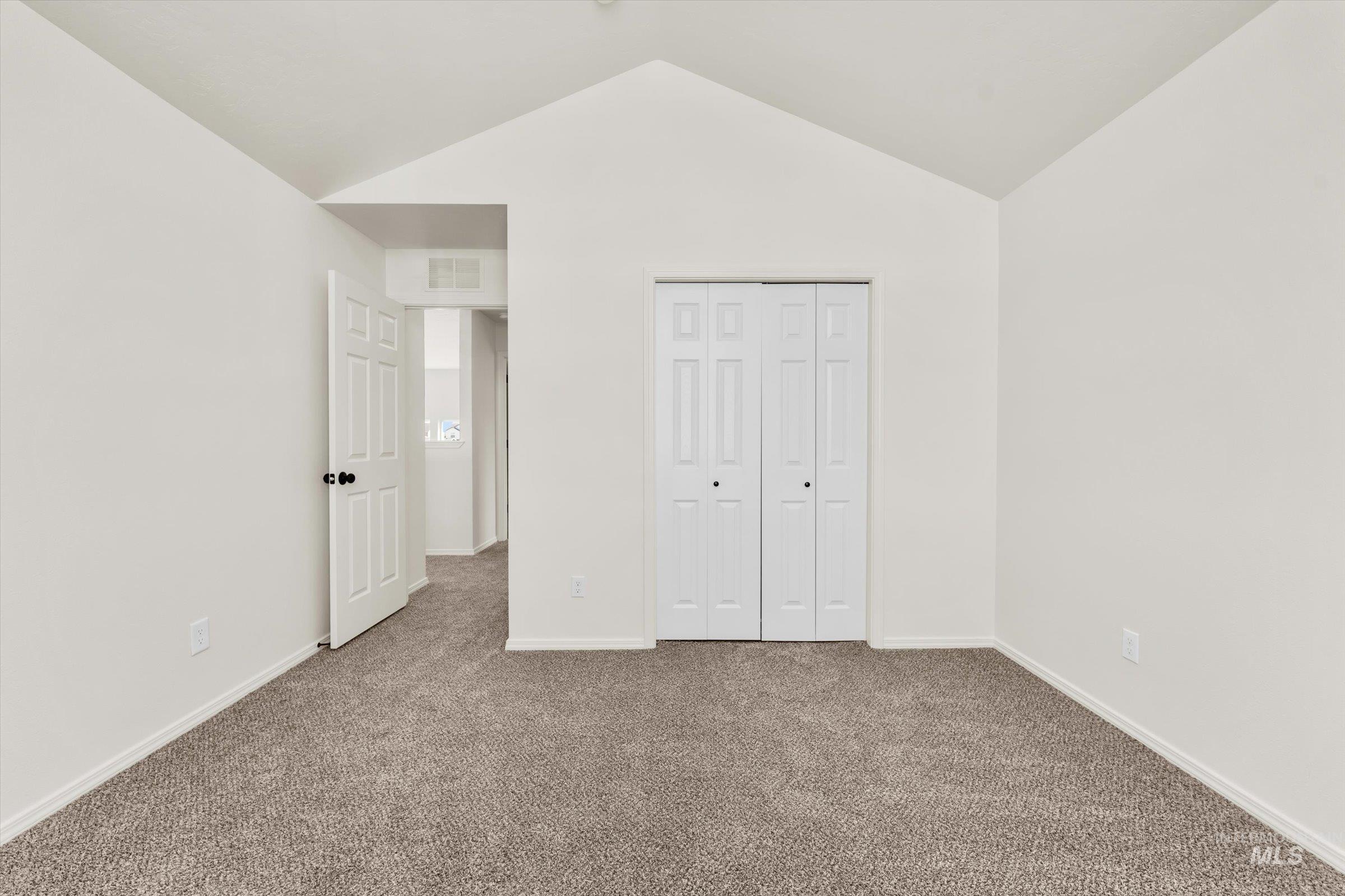 5602 Barkley Way Caldwell, ID 83607 - Photo 24 of 36 Unfurnished bedroom featuring carpet and a closet