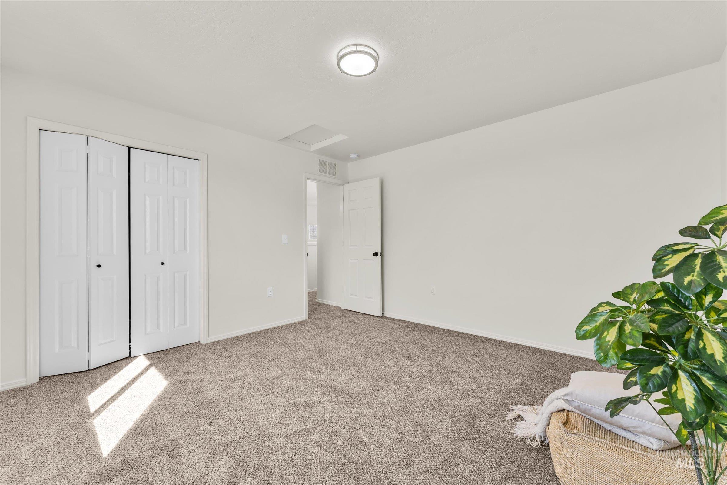 5602 Barkley Way Caldwell, ID 83607 - Photo 27 of 36 Unfurnished bedroom with carpet and a closet