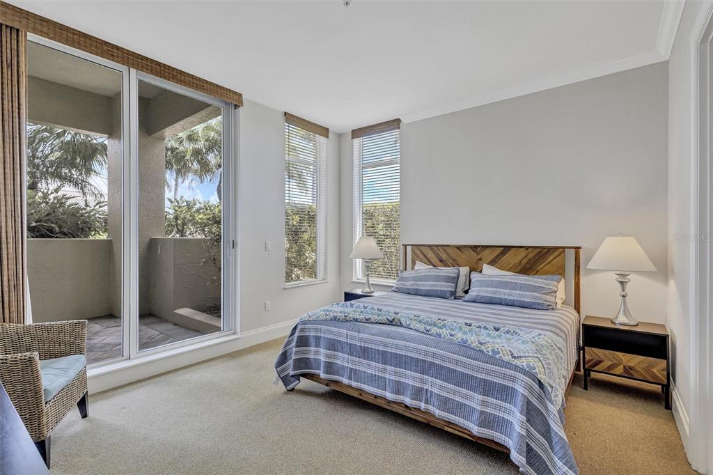 140 Riviera Dunes Way, Unit 206 Palmetto, FL 34221 - Photo 45 of 46 a bedroom with a bed and a window