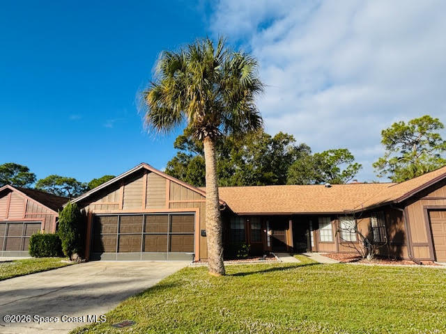 1353 Nelson Court Rockledge, FL 32955 - Photo 8 of 13 a view of a house with a yard potted plants and a table