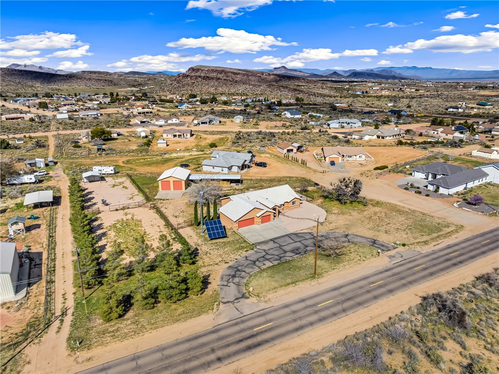 2205 East Cactus Wren Road Kingman, AZ 86409 - Photo 4 of 68 View of Front of home, circular drive, 2 Arenas, Detached Garage, Stables