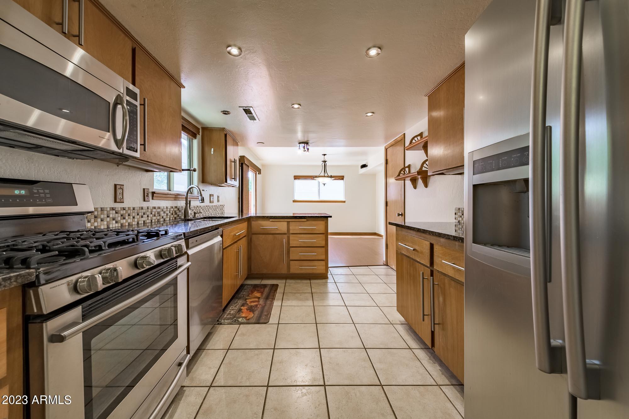 3124 Kyle Loop Flagstaff, AZ 86004 - Photo 11 of 31 Facing Kitchen from Laundry Area