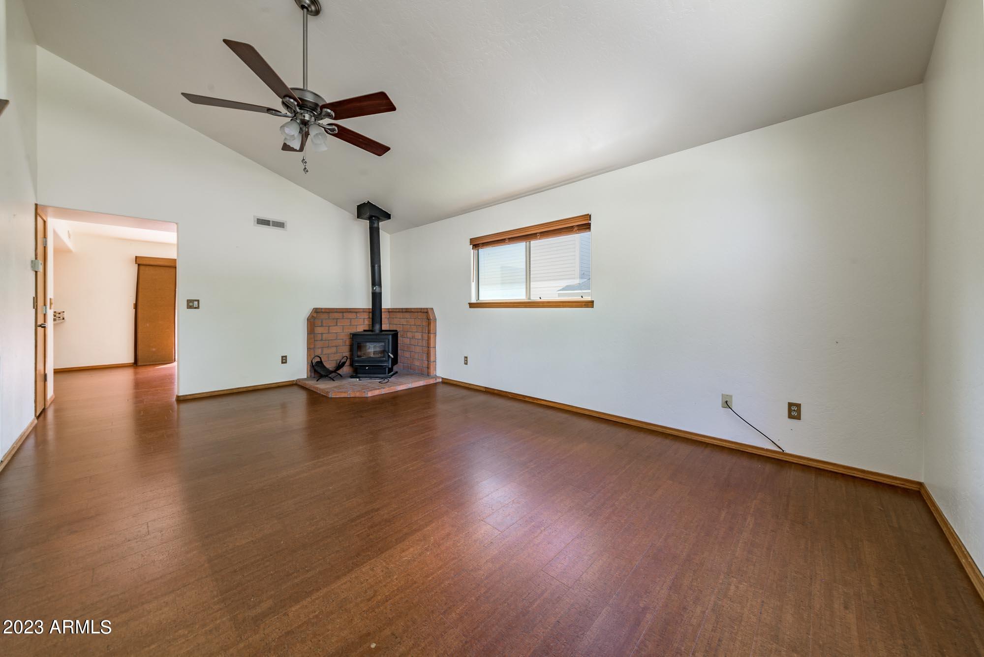 3124 Kyle Loop Flagstaff, AZ 86004 - Photo 4 of 31 Living Room with Wood Burning Fireplace
