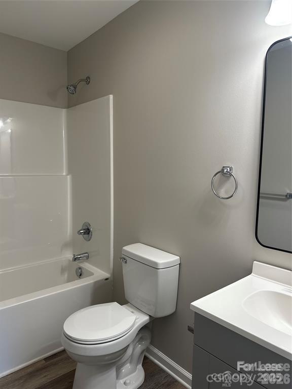 43 Hawkins Road, Unit 1 Marion, NC 28752 - Photo 5 of 10 a white toilet sitting next to a bath tub and a shower