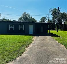 43 Hawkins Road, Unit 1 Marion, NC 28752 - Photo 10 of 10 a house view with a garden space