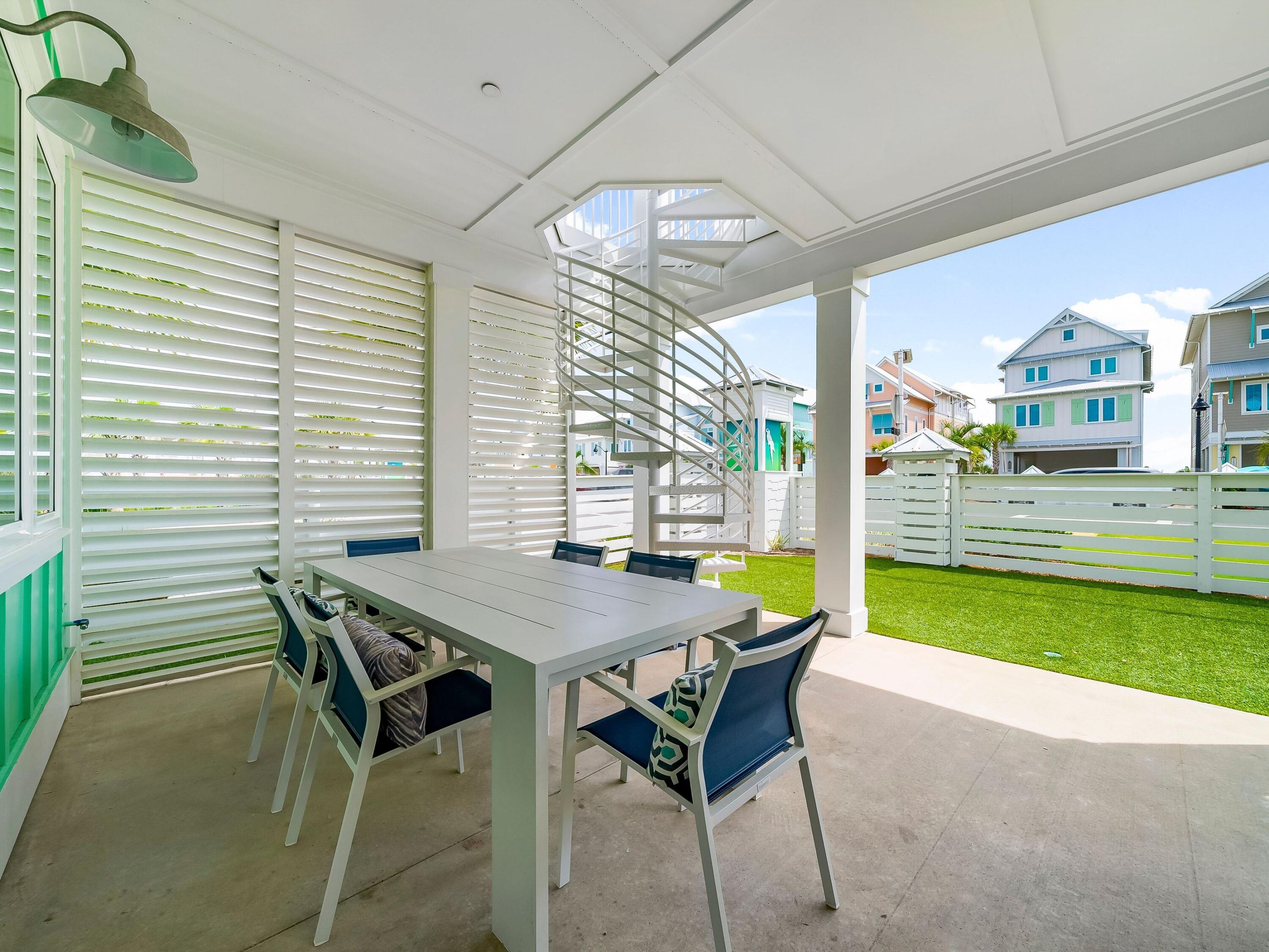 13650 Front Beach Road Panama City Beach, FL 32413 - Photo 17 of 49 a view of a dining room with furniture window and outside view