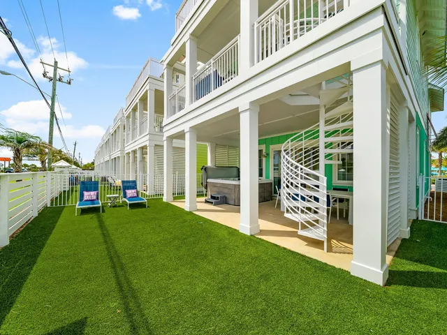 a view of a house with a yard and plants