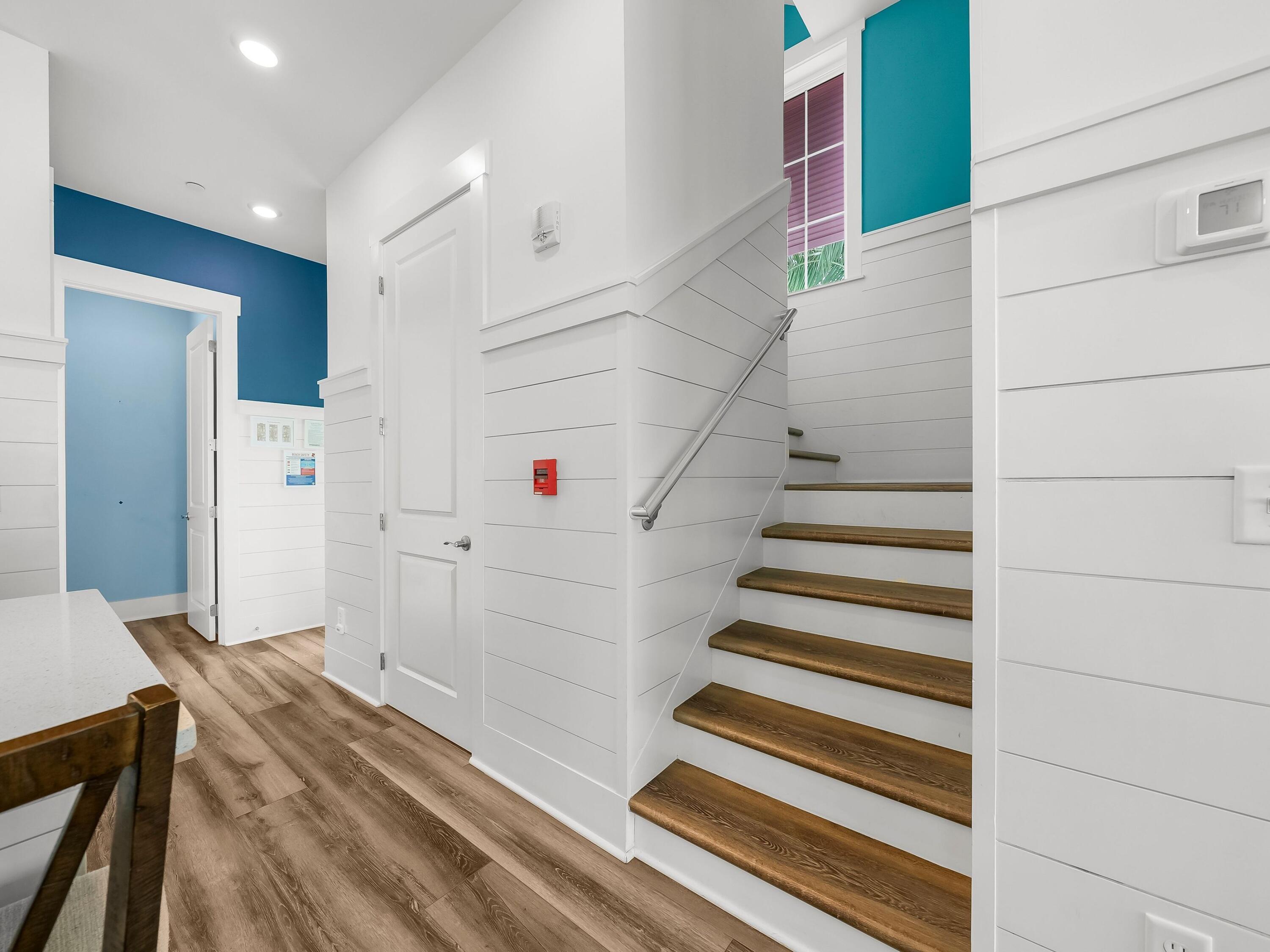 13650 Front Beach Road Panama City Beach, FL 32413 - Photo 24 of 49 a view of entryway and hall with wooden floor