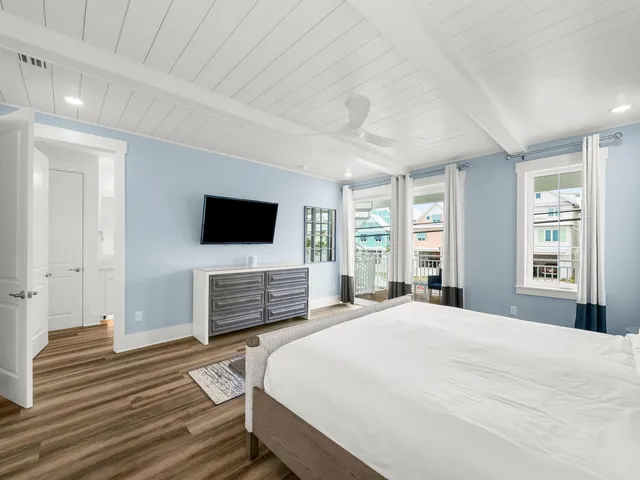 a spacious bathroom with a shower sink and mirror