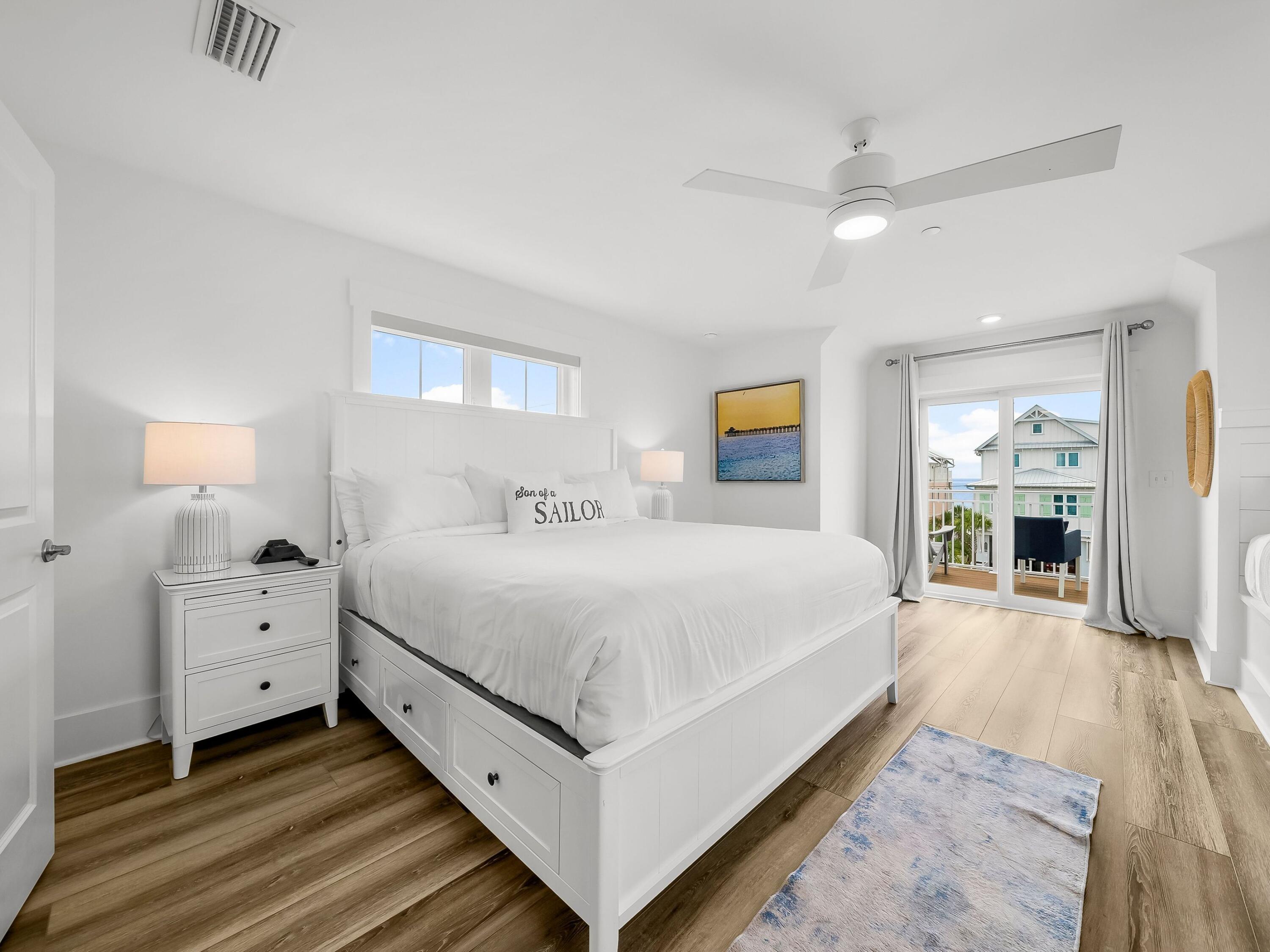 13650 Front Beach Road Panama City Beach, FL 32413 - Photo 47 of 49 a bed room with a bed and a tv