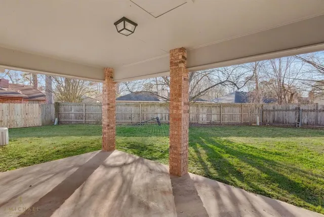 a view of a porch with a backyard