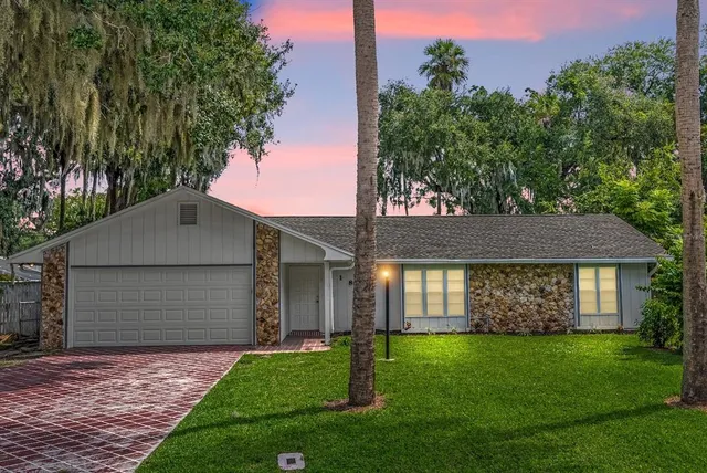 front view of a house with a yard