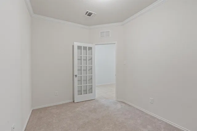 an empty room with windows