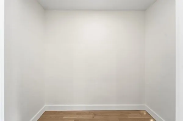 a backyard of a house with barbeque oven