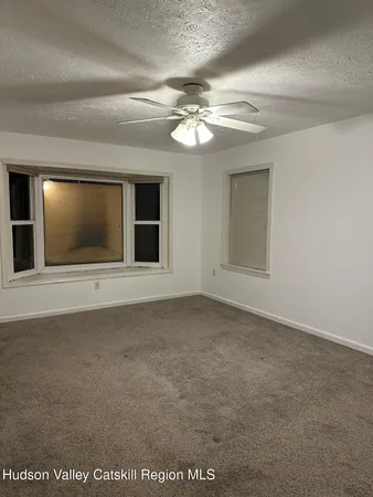 an empty room with cabinet