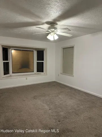 an empty room with cabinet