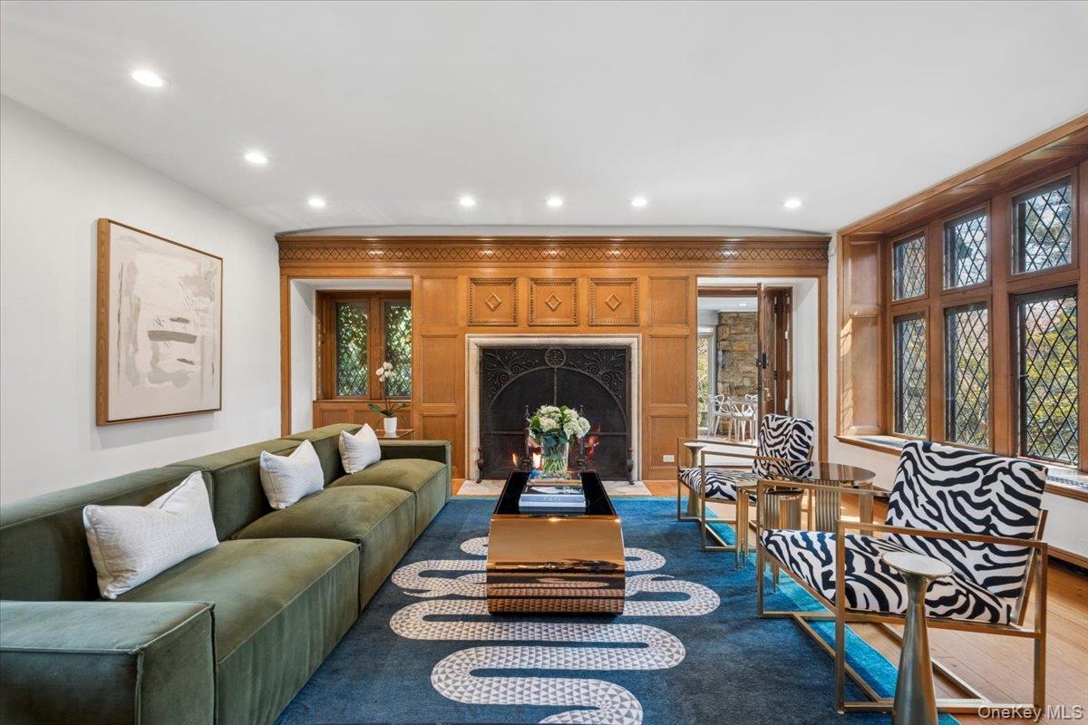 66 Lockwood Road Scarsdale, NY 10583 - Photo 14 of 47 Living room with direct access to the enclosed sunroom