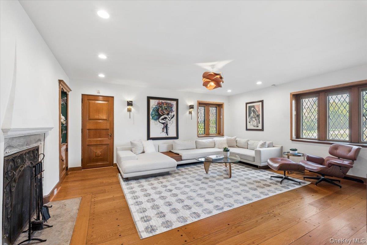 66 Lockwood Road Scarsdale, NY 10583 - Photo 19 of 47 Warm and inviting family room with fireplace