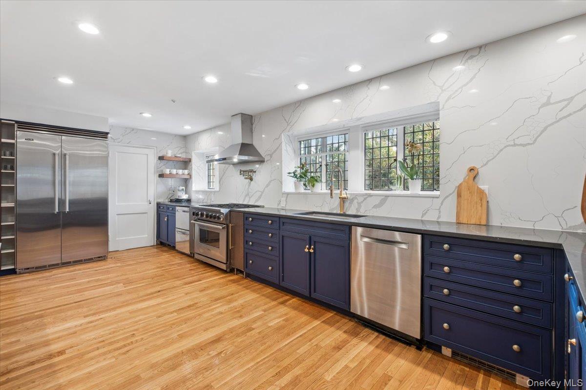 66 Lockwood Road Scarsdale, NY 10583 - Photo 24 of 47 Chef’s kitchen with new stainless steel appliances