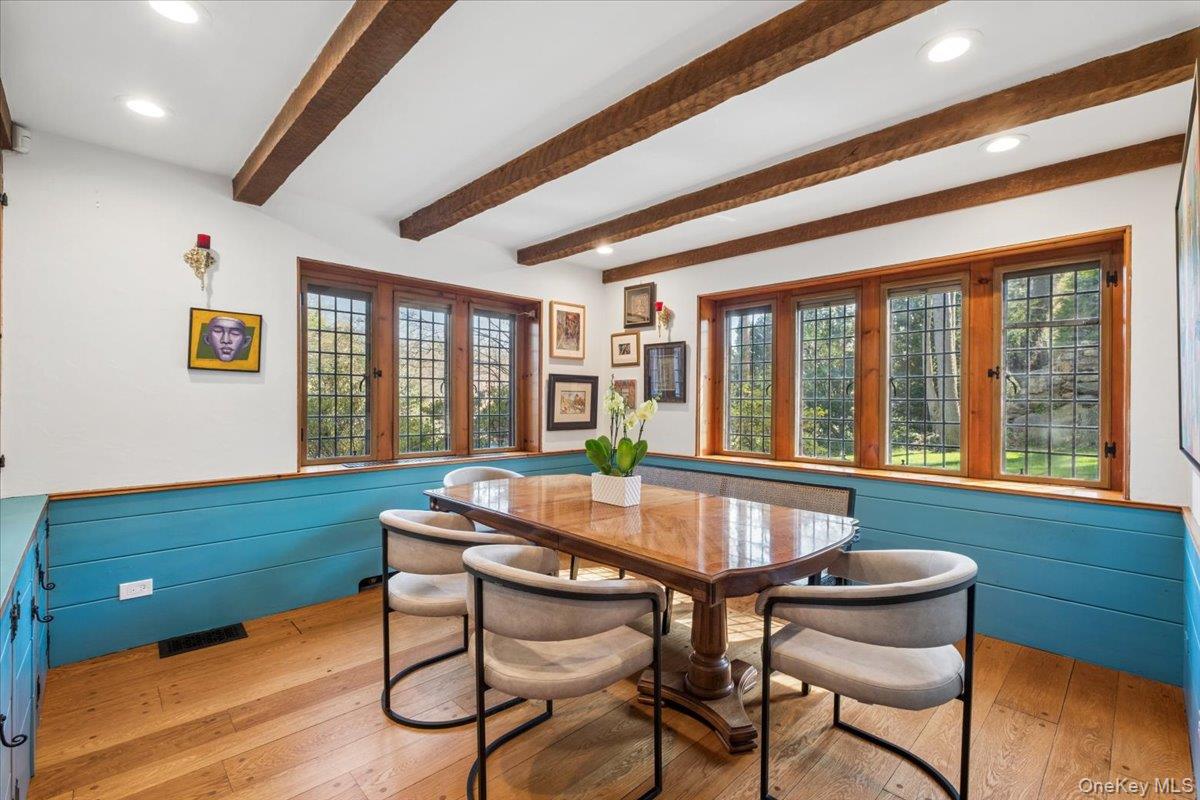 66 Lockwood Road Scarsdale, NY 10583 - Photo 26 of 47 Formal dining room with scenic backyard views