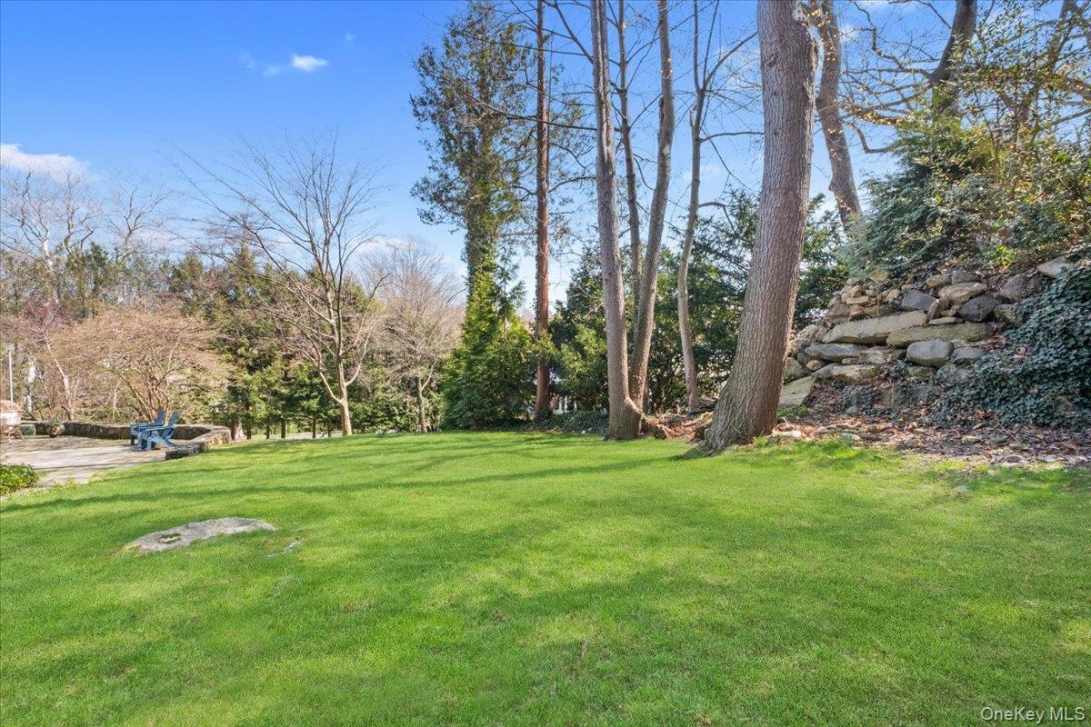 66 Lockwood Road Scarsdale, NY 10583 - Photo 7 of 47 Backyard with patio, perfect for outdoor entertaining