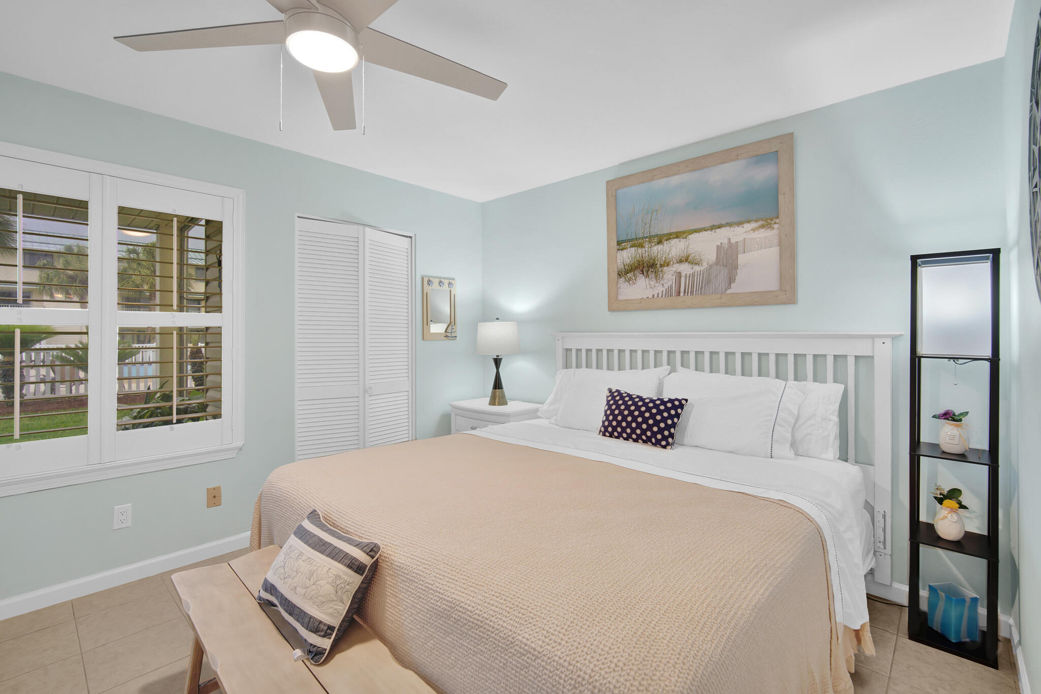 60 Sandprints Drive, Unit E7 Miramar Beach, FL 32550 - Photo 14 of 26 a bedroom with a bed and a painting on the wall