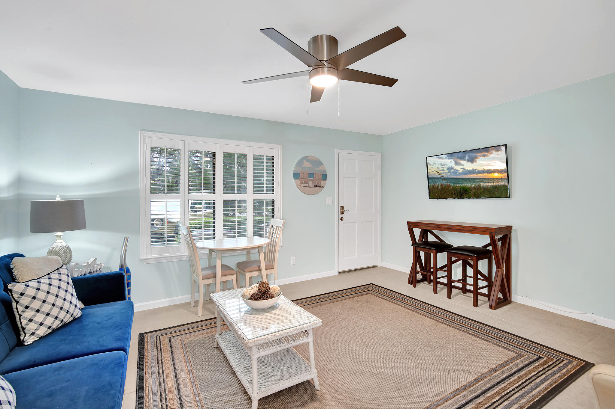 60 Sandprints Drive, Unit E7 Miramar Beach, FL 32550 - Photo 6 of 26 a living room with furniture and a large window