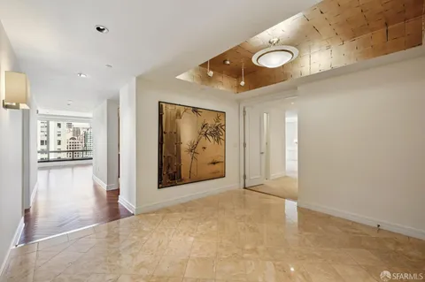 a multi story building with glass windows