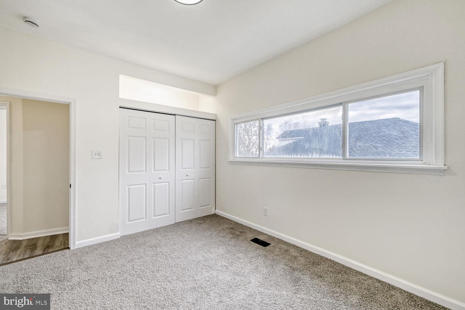 207 South Rock Glen Road Baltimore, MD 21229 - Photo 14 of 28 Bright and airy room with natural light.