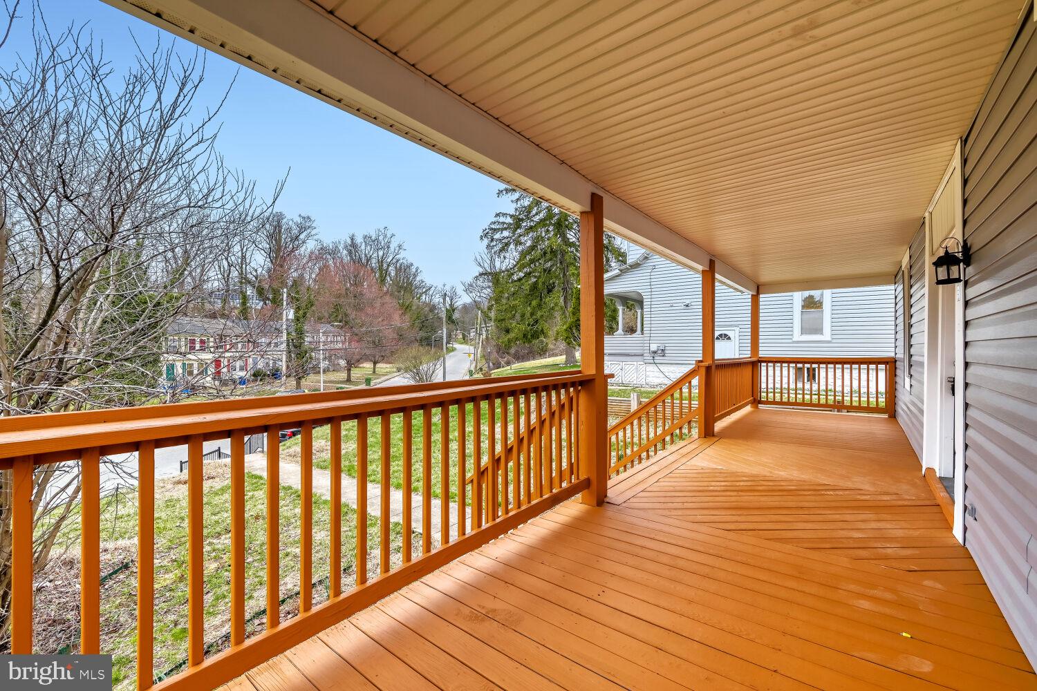 207 South Rock Glen Road Baltimore, MD 21229 - Photo 3 of 28 Inviting porch with scenic views.
