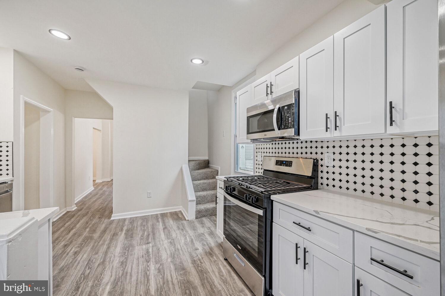 207 South Rock Glen Road Baltimore, MD 21229 - Photo 6 of 28 Modern kitchen with stylish finishes.