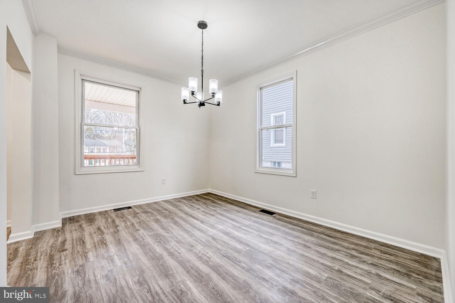 207 South Rock Glen Road Baltimore, MD 21229 - Photo 9 of 28 Bright and airy dining space awaits.