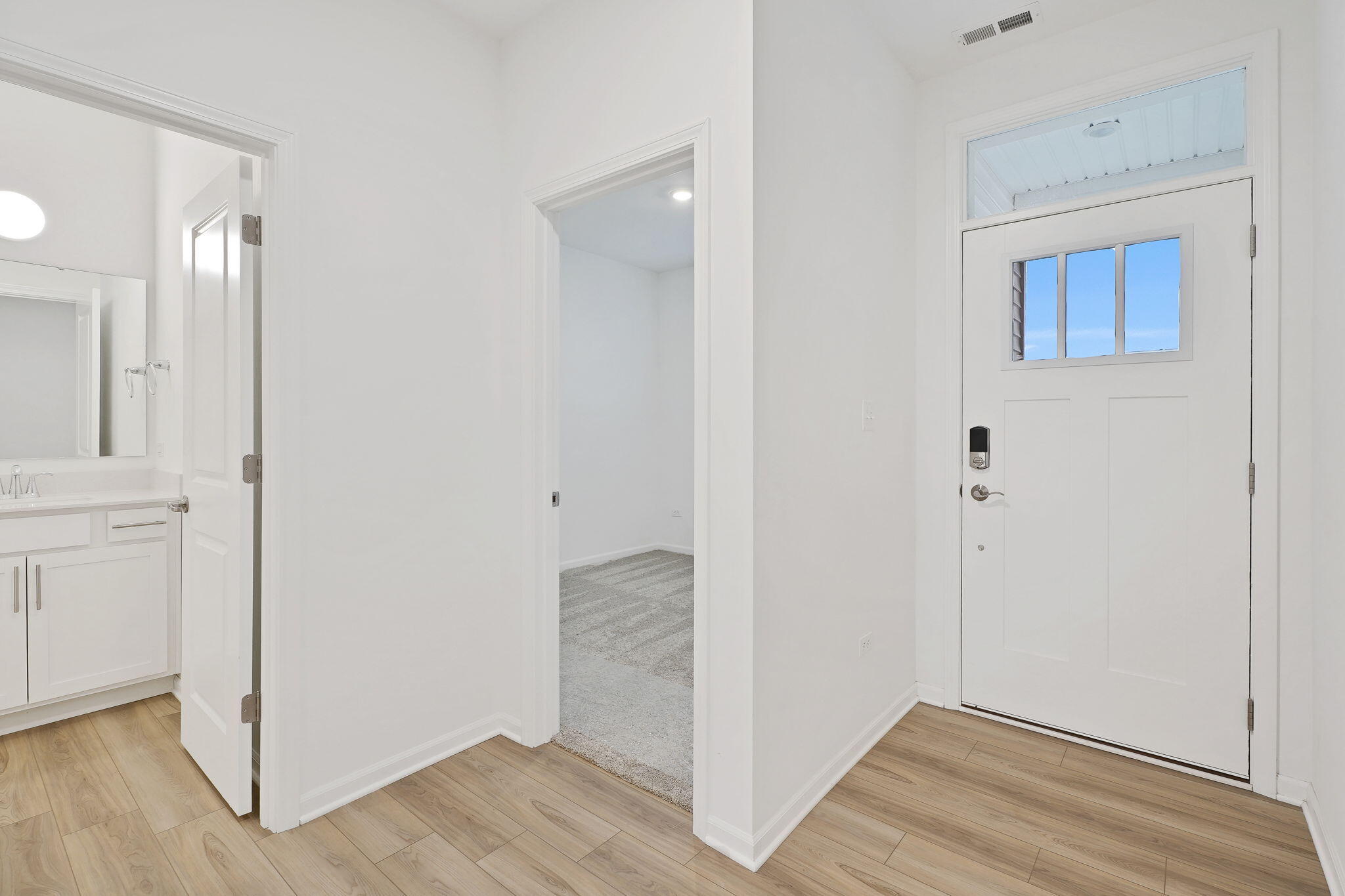12541 Virginia Street Crown Point, IN 46307 - Photo 2 of 24 wooden floor in an empty room