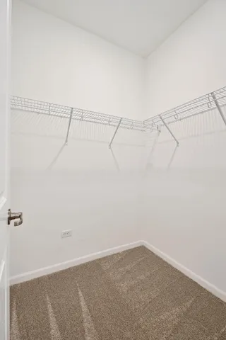 a view of a room with racks on the wall