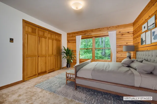 a view of an empty room with wooden door