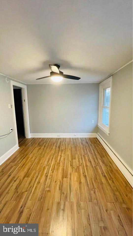 153 Main Street, Unit 4 Phoenixville, PA 19460 - Photo 7 of 9 a view of empty room with wooden floor