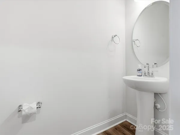 a bathroom with a sink and mirror