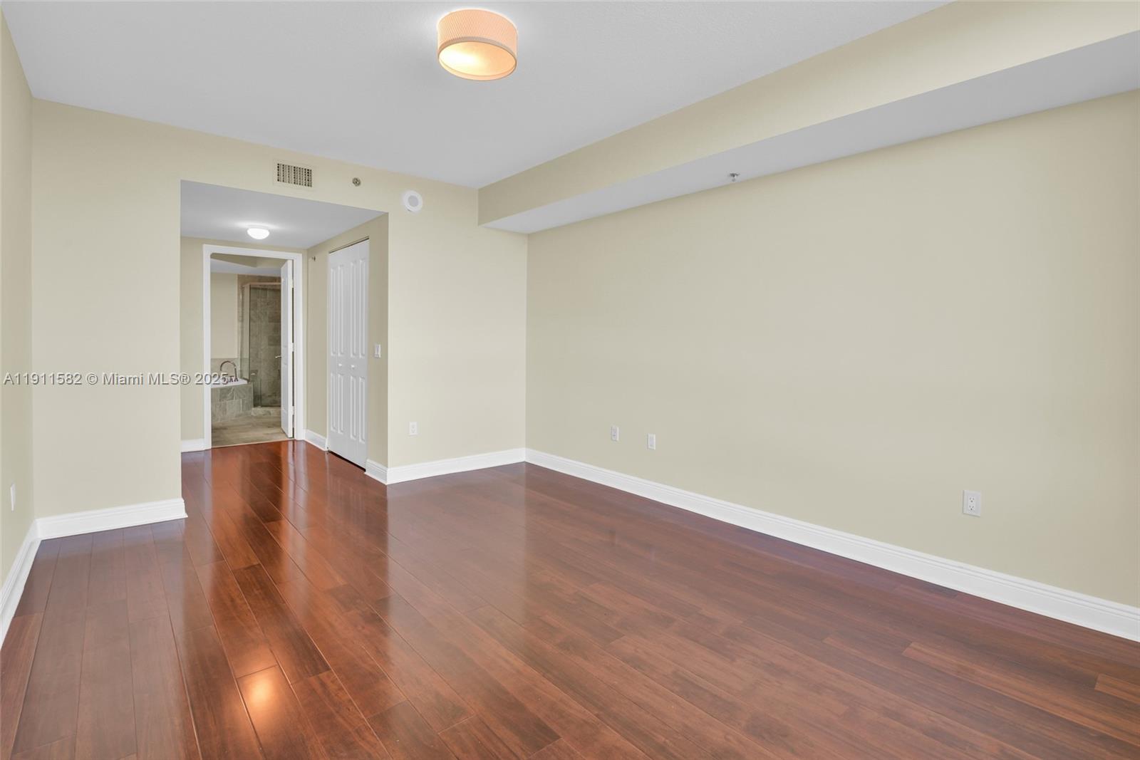 2681 North Flamingo Road, Unit 1903S Sunrise, FL 33323 - Photo 27 of 55 wooden floor in an empty room