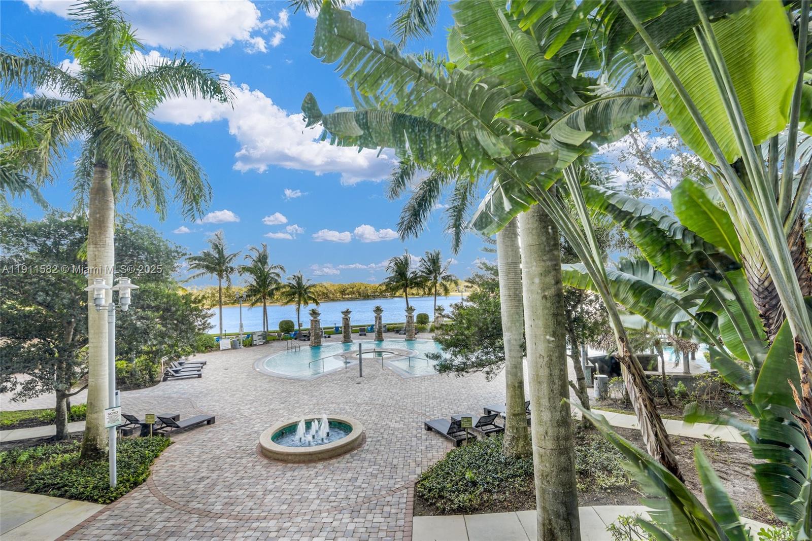 2681 North Flamingo Road, Unit 1903S Sunrise, FL 33323 - Photo 42 of 55 a view of a swimming pool with a patio